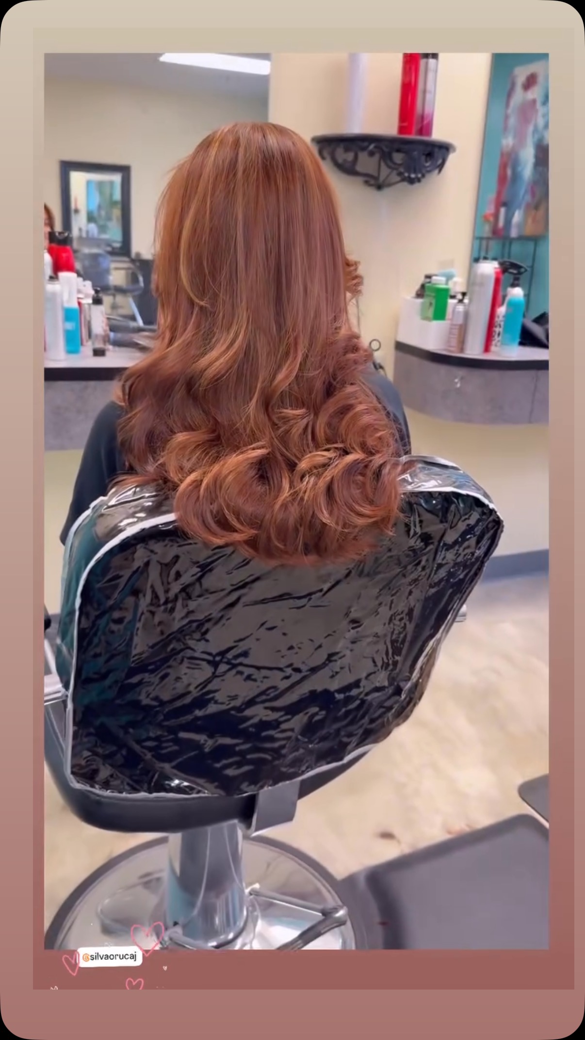 A woman with long styled hair